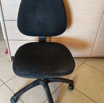 Office armchair with adjustable height and backrest