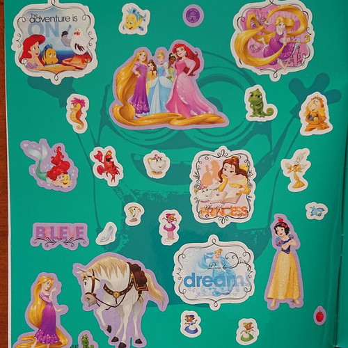 Minions sticker album used, half completed by GIM S.A.