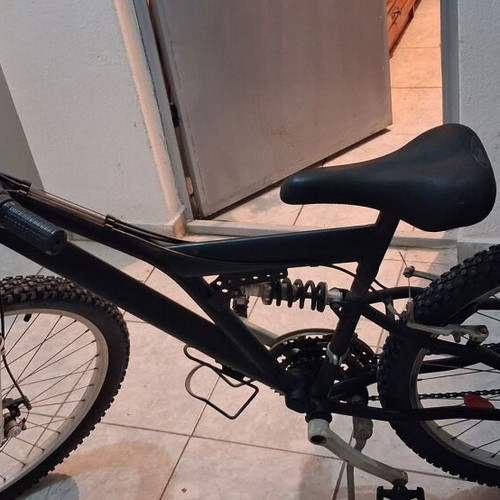 Mountain bike black used with front and rear suspension, V-brakes