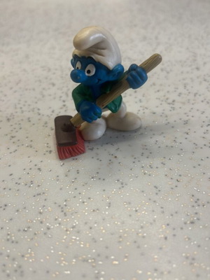 Schleich Smurf figure with broom used
