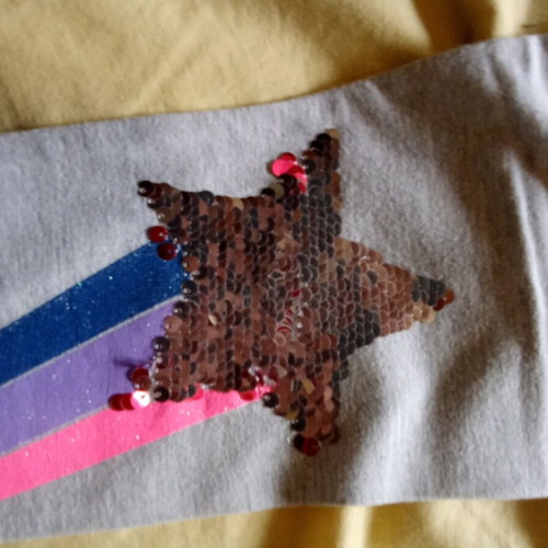 Grey leggings with sequined star on knees, like new, age 5