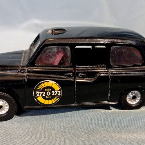 Corgi Austin London Taxi diecast model with opening doors like new