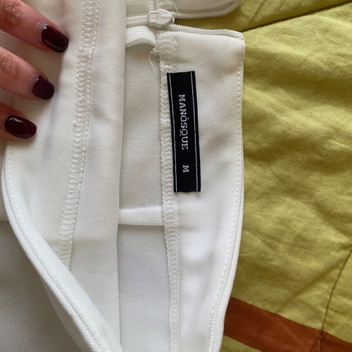 White skirt with unique front design like new