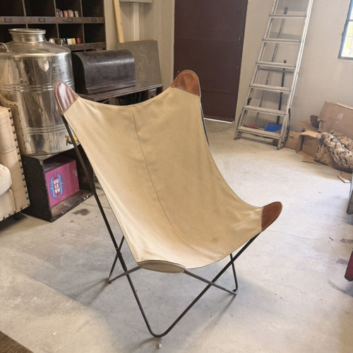 Butterfly chair used with removable cover and foldable frame