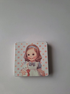 Pocket mirror with girl design used, pink