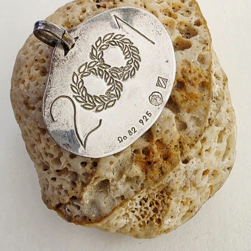 Silver pendant Nikos Eggonopoulos 925 with ruby like new, lucky charm 2001