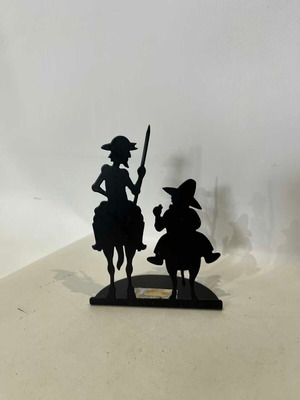 Vintage metal bookend with Don Quixote and Sancho Panza design used