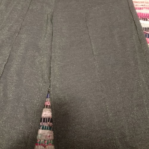 Glitter pants used, green and gold, with small hole