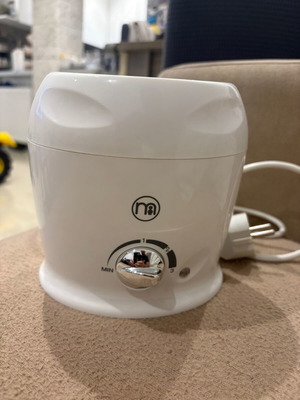Container for warming baby bottle with milk like new