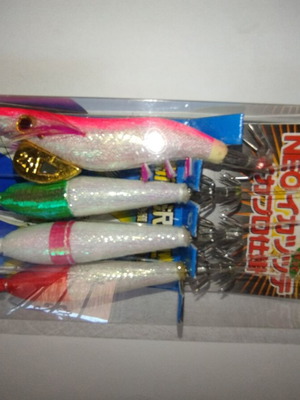 Fishing rig with squid jigs new, 3 light and 1 with 2.5gr weight, 5 meters