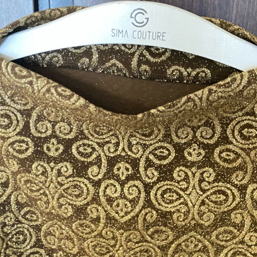 Long-sleeve brown shirt new with shiny gold patterns