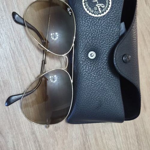 Ray Ban sunglasses with gradient lens gold brown large like new