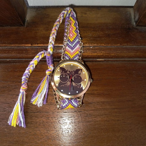 Wristwatch like new with handmade colorful strap and cat dial