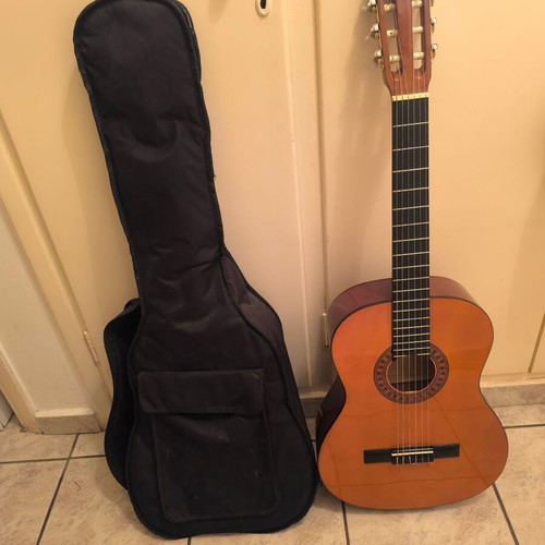 Classical guitar with fabric back case like new
