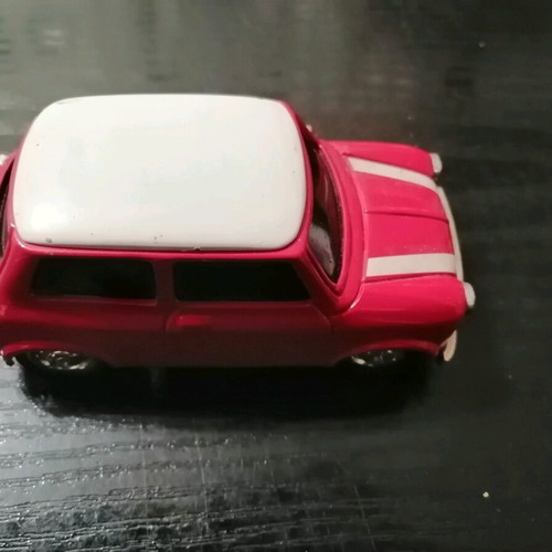 Mini Cooper miniature with clock used, red with white roof