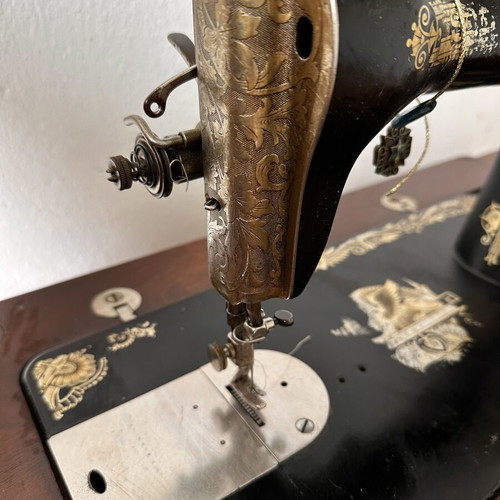 Singer sewing machine used, collectible antique with original cast iron base