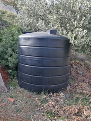 Black 5000-liter vertical cylindrical water and oil tank