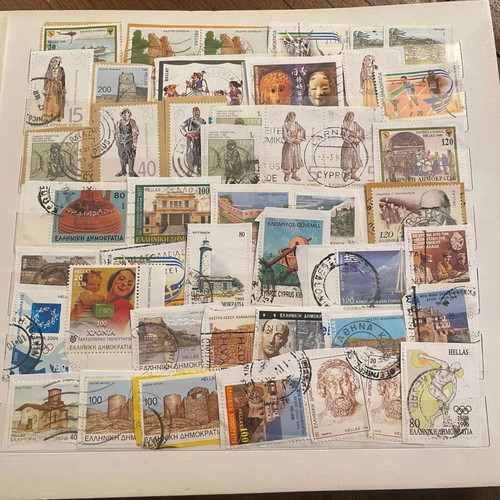 Stamp collection used with album, over 500 pieces