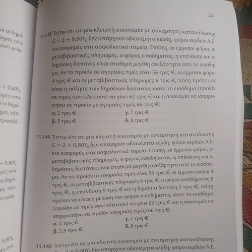 Themes of Microeconomics and Macroeconomics like new, 1200 multiple choice questions