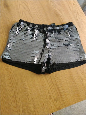 H&M sequin shorts like new, black and silver, size M