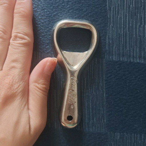 Vintage Coca Cola bottle opener used, fully functional
