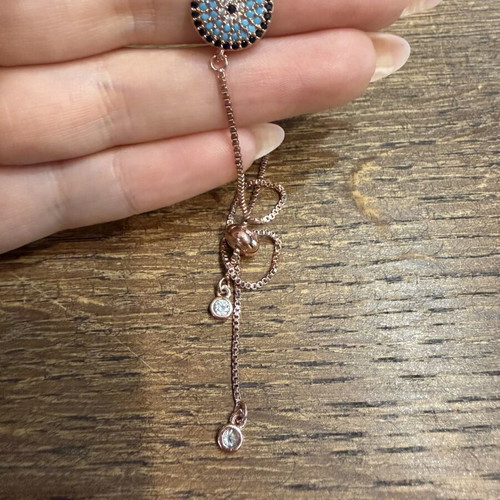 Bracelet with Eye and Zircon Details in Rose Gold, New