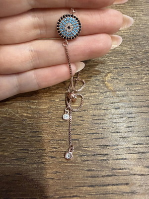 Bracelet with Eye and Zircon Details in Rose Gold, New