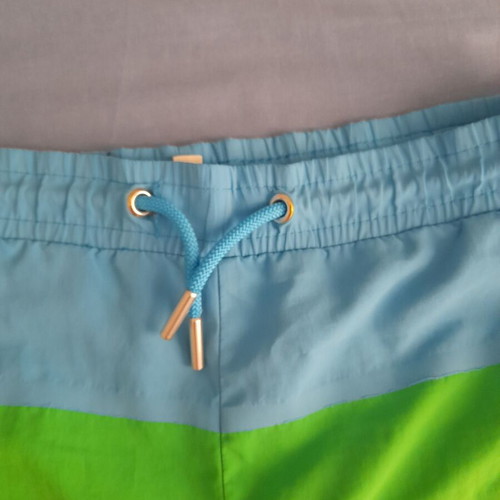 Lacoste swim shorts used, multicolor, size 128 cm