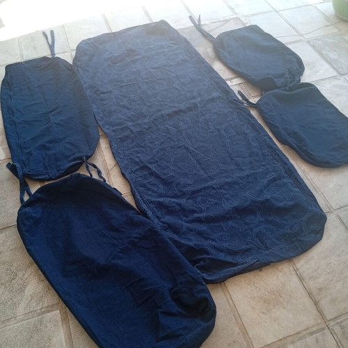 Set of cushion covers like new, dark blue with embossed design