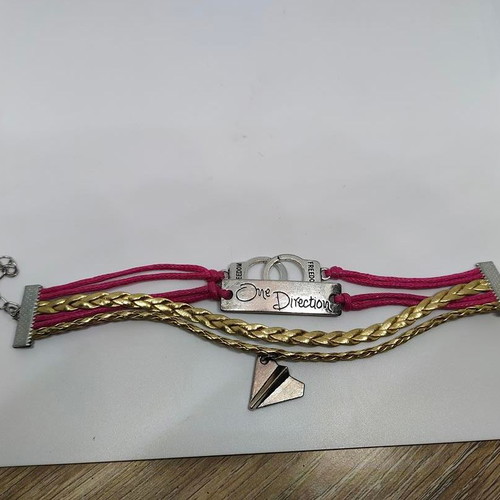 One Direction collectible bracelet like new with metal details