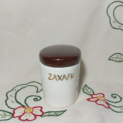 Vintage ceramic sugar container used with floral design and brown lid