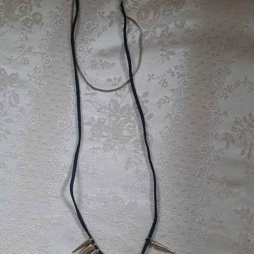 Necklace new with studs and long cord