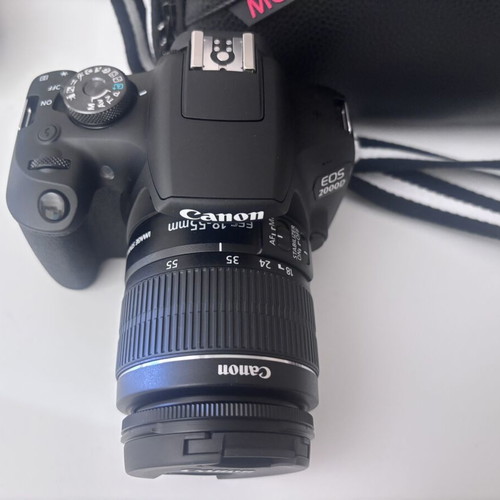 Canon EOS 2000D camera with case and tripod