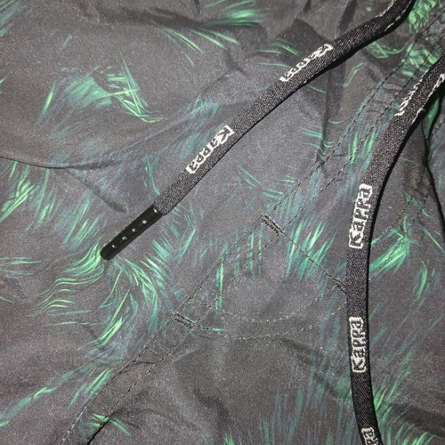 Kappa swimsuit new, size medium, black and green with pockets