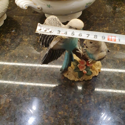 Figurine of two beautiful parrots on a branch like new