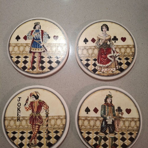 Set of 4 collectible ceramic coasters like new, 10cm diameter