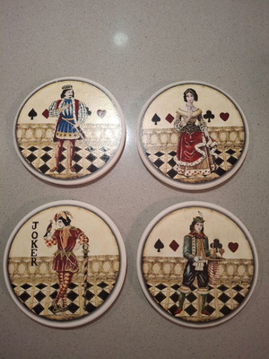 Set of 4 collectible ceramic coasters like new, 10cm diameter