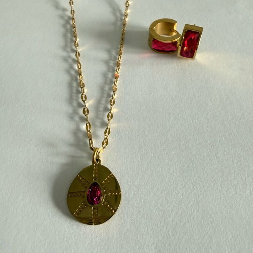 Steel earrings and necklace set like new, gold-colored