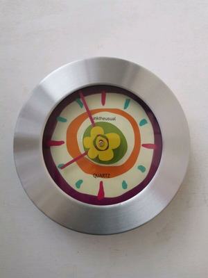 Funktheusual wall clock used, analog