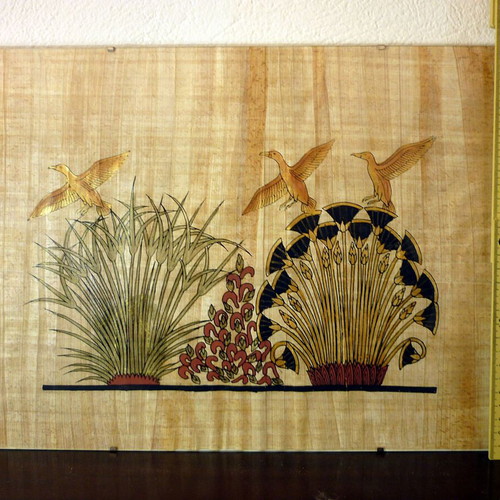 Egyptian papyrus with painting in glass frame