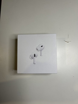 Air Pods Pro 2 wireless earbuds with charging cable and ear tips