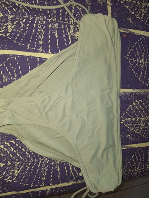 Triumph swimwear mint color with side tie like new, size L