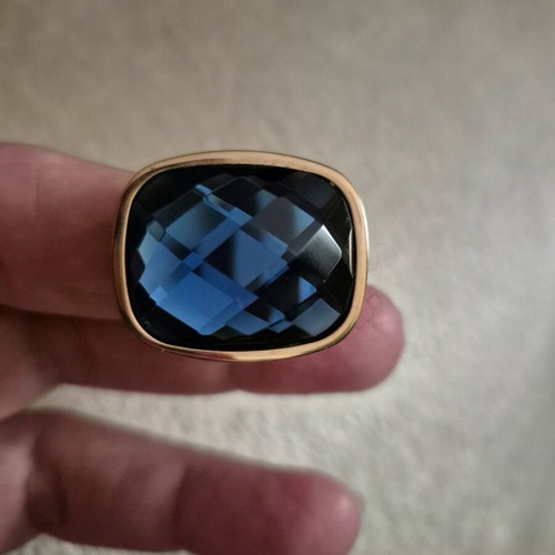 Ring with blue stone like new, gold-colored