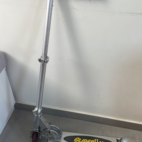 Scooter used with adjustable handlebar height and rear wheel brake