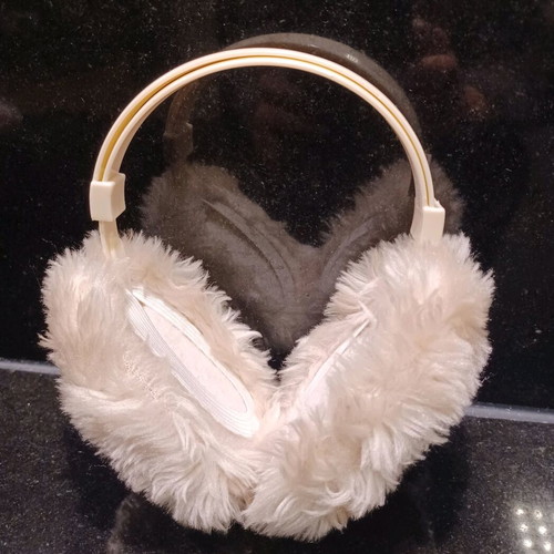 Ear protectors like new, ecru, foldable with size adjustment