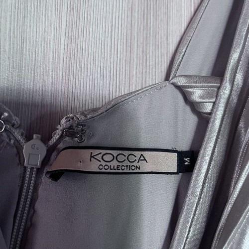 Kocca maxi metallic dress with pleated design and crossover neckline