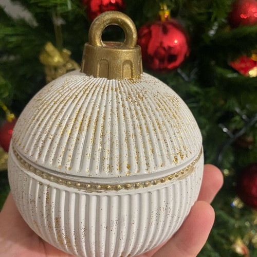 Soy candle in handmade porcelain container with fragrance