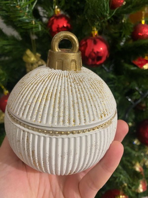 Soy candle in handmade porcelain container with fragrance