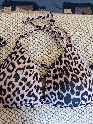 Leopard print swimsuit S-M like new with cut bottom and good chest lining