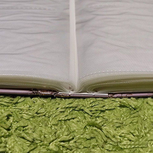 Photo album 10x15 new, holds 200 photos